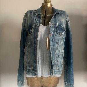 Distressed jean jacket with pockets
